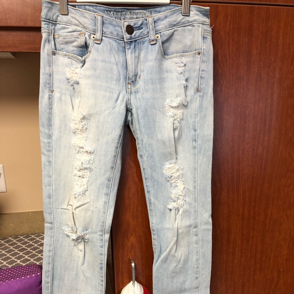 Distressed AE skinny jeans